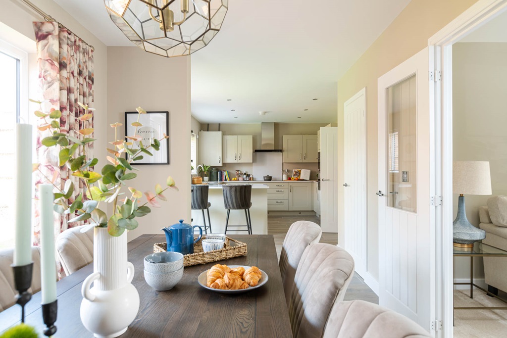 Property 3 of 12. An Open Plan Kitchen Dining Room Is Designed For Family Mealtimes