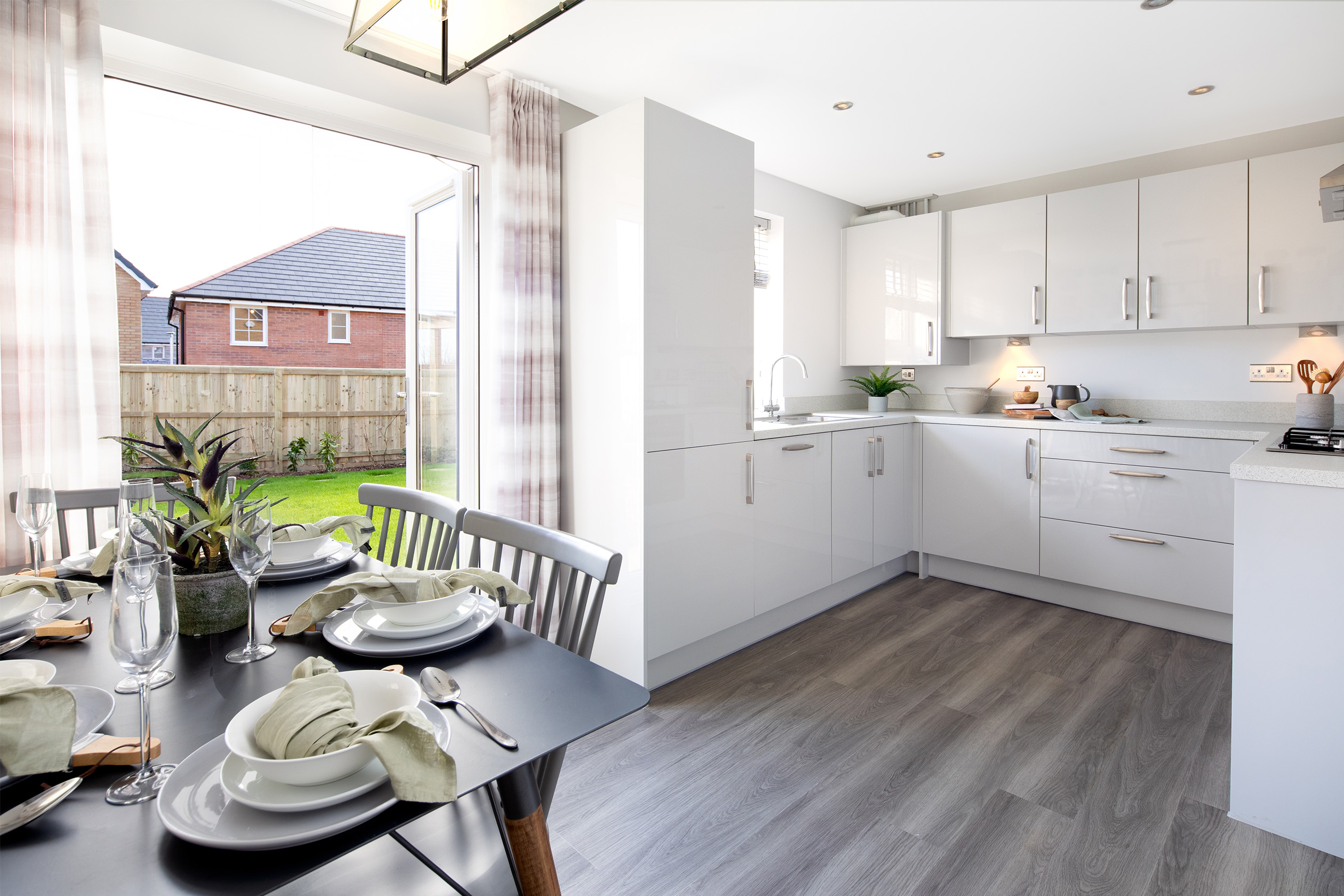 Property 3 of 9. Open Plan Kitchen With French Doors To The Garden In The Moresby 3 Bedroom Home