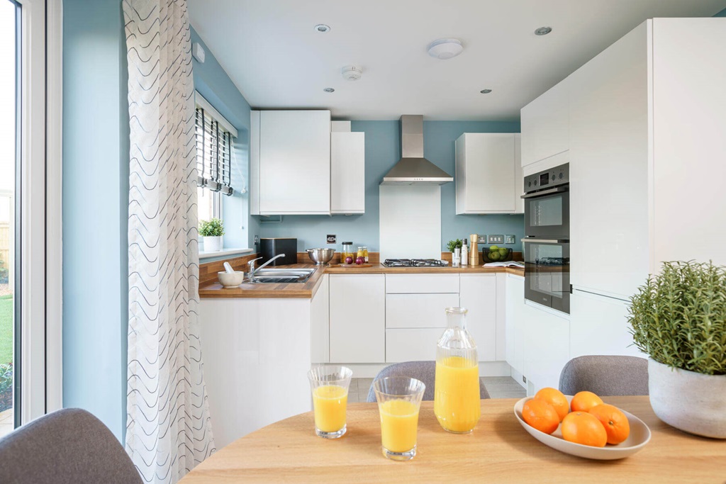 Property 3 of 9. An A Bright And Airy Kitchen And Dining Area Opens Through Double Doors To The Garden, Perfect For